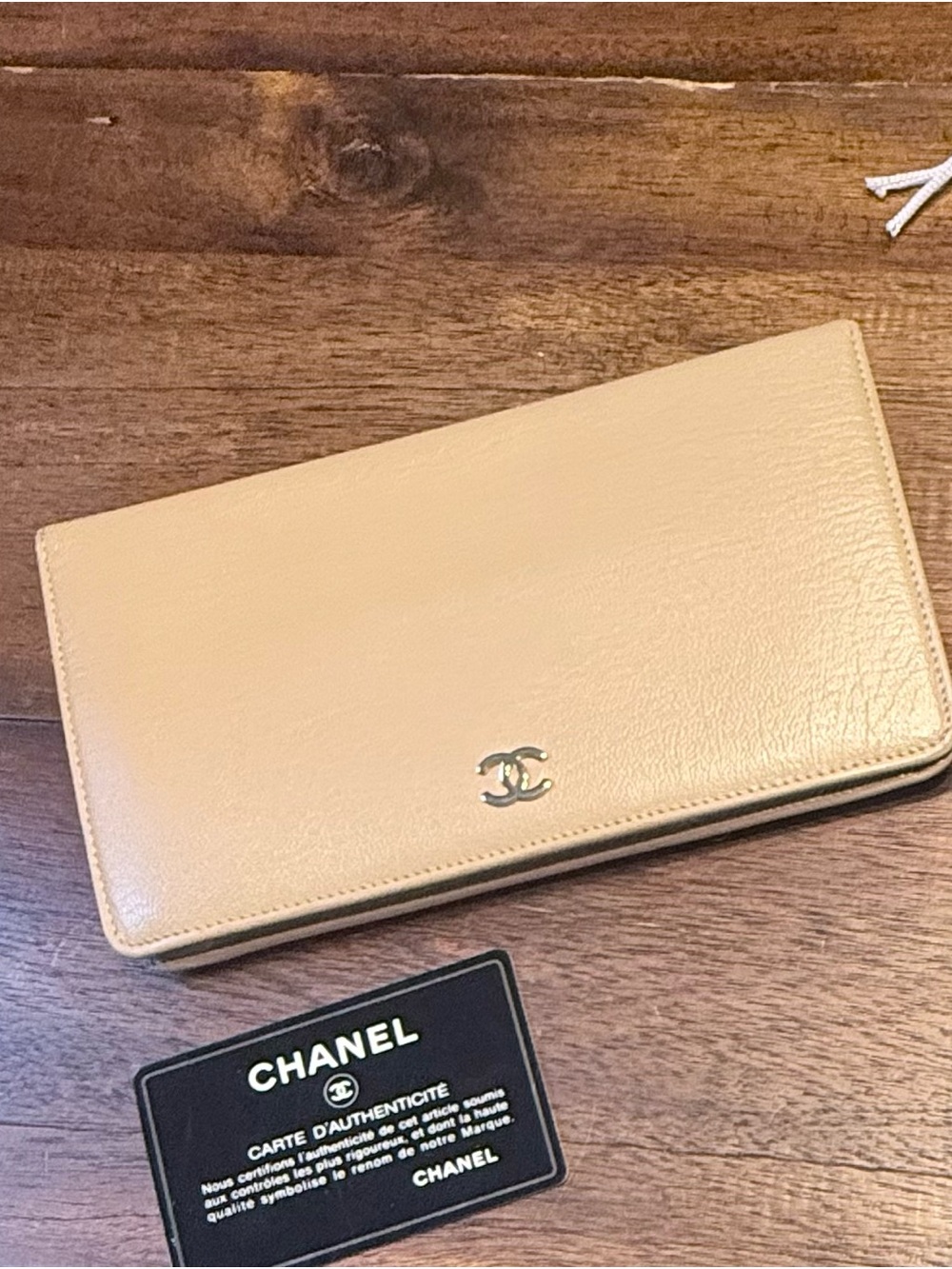 CHANEL Beige Leather Zip Wallet with Silver CC Emblem